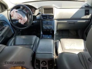 2008 Honda Pilot EX-L z VIN 5FNYF18758B031962, wystawiony jako Copart lot #69118424 z przebiegiem 168 215 mil mil oraz Szkoda całkowita • Salvage title. Historia ofert i sprzedaży dostępna na DreamBid. Obrazek 8.