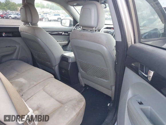 2011 Kia Sorento LX with VIN 5XYKTCA17BG023751, listed as a IAAI auction lot 42176584 with 173,072 mi miles and . Bid and sale history available at DreamBid. Image 8.