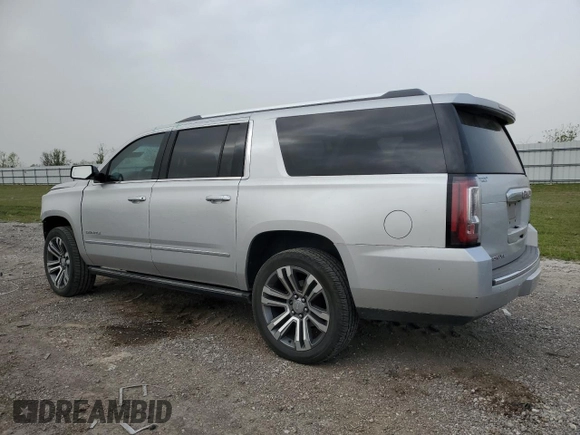 2019 GMC Yukon XL Denali with VIN 1GKS1HKJ1KR132018, listed as a Copart auction lot 49337035 with 73,216 mi miles and Salvage Title. Bid and sale history available at carsss.com. Image 2.