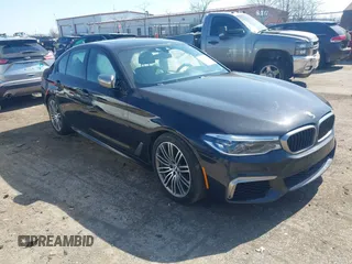 2019 BMW 5 Series M550i xDrive with VIN WBAJB9C51KB464879, listed as a IAAI auction lot 41774834 with 77,379 mi miles and . Bid and sale history available at DreamBid. Image 1.