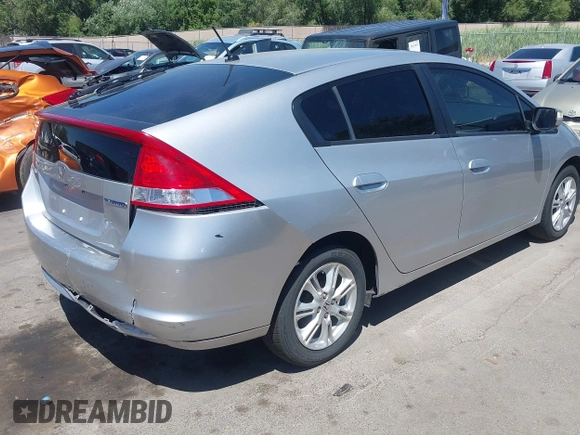 2010 Honda Insight EX with VIN JHMZE2H74AS041533, listed as a IAAI auction lot 42675766 with 203,357 mi miles and . Bid and sale history available at DreamBid. Image 4.