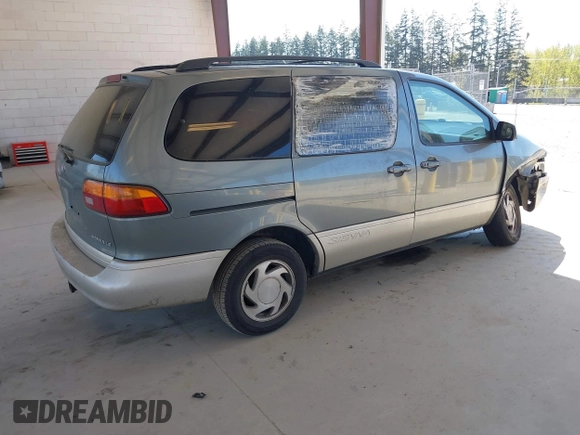 1999 Toyota Sienna LE with VIN 4T3ZF13C4XU166786, listed as a IAAI auction lot 42057995 with 316,259 mi miles. Bid and sale history available at carsss.com. Image 4.