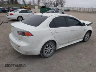 2014 Mitsubishi Lancer ES with VIN JA32U2FU4EU002366, listed as a IAAI auction lot 41942673 with 117,934 mi miles. Bid and sale history available at carsss.com. Image 4.