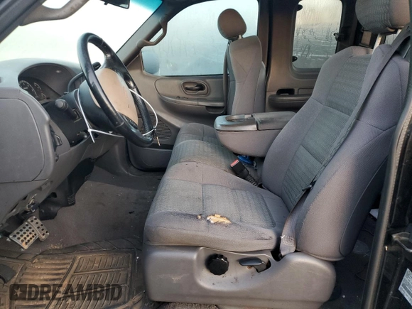 2002 Ford F-150 XL with VIN 2FTRX08L72CA44252, listed as a Copart auction lot 77344214 with 255,001 mi miles and Clean title. Bid and sale history available at DreamBid. Image 7.
