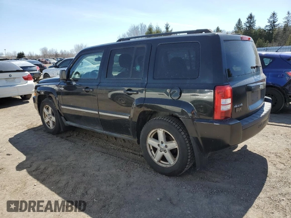 2010 Jeep Patriot Sport with VIN 1J4NF2GB6AD622212, listed as a Copart auction lot 52601705 with 218,001 mi miles and Clean Title. Bid and sale history available at carsss.com. Image 2.