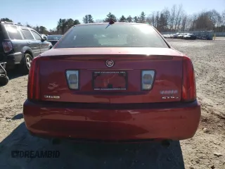 2009 Cadillac STS AWD z VIN 1G6DD67VX90138316, wystawiony jako Copart lot #80915524 z przebiegiem 112 290 mil mil oraz Czysty tytuł • Clean title. Historia ofert i sprzedaży dostępna na DreamBid. Obrazek 6.