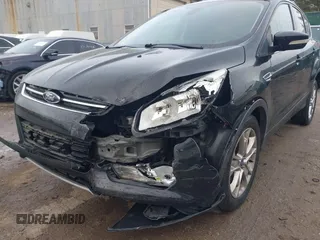2013 Ford Escape SEL with VIN 1FMCU9H93DUC79592, listed as a IAAI auction lot 42039037 with 63,020 mi miles and . Bid and sale history available at DreamBid. Image 6.