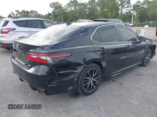 2021 Toyota Camry SE Nightshade with VIN 4T1G11AK2MU471174, listed as a IAAI auction lot 41740546 with 77,037 mi miles. Bid and sale history available at carsss.com. Image 4.