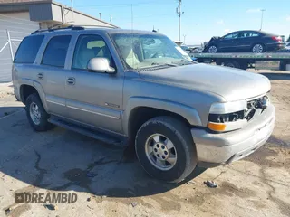 2002 Chevrolet Tahoe LS z VIN 1GNEC13Z92R278513, wystawiony jako IAAI lot #41453414 z przebiegiem 136 447 mil mil oraz . Historia ofert i sprzedaży dostępna na DreamBid. Obrazek 1.