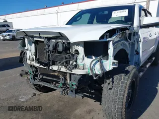 2017 Toyota Tacoma SR5 with VIN 3TMDZ5BN3HM023813, listed as a IAAI auction lot 41522828 with 128,533 mi miles and . Bid and sale history available at DreamBid. Image 6.