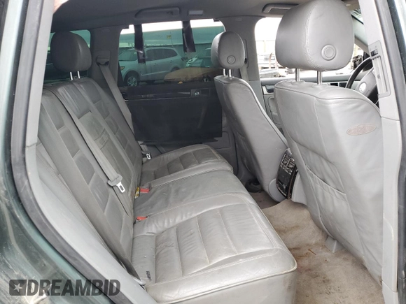 2004 Volkswagen Touareg with VIN WVGCM67L04D027410, listed as a Copart auction lot 79044964 with 100,509 mi miles and Salvage title. Bid and sale history available at DreamBid. Image 11.