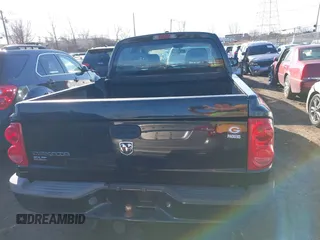 2006 Dodge Dakota SLT z VIN 1D7HW48K66S632826, wystawiony jako IAAI lot #41635407 z przebiegiem 208 046 mil mil oraz . Historia ofert i sprzedaży dostępna na DreamBid. Obrazek 17.