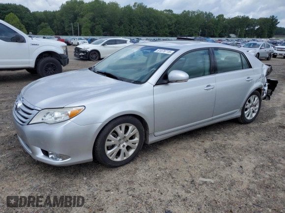 2012 Toyota Avalon with VIN 4T1BK3DB6CU442001, listed as a Copart auction lot 61078715 with 99,245 mi miles and Salvage title. Bid and sale history available at DreamBid. Image 1.