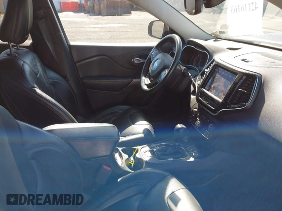 2019 Jeep Cherokee Limited with VIN 1C4PJMDX0KD319579, listed as a IAAI auction lot 42116163 with 94,013 mi miles. Bid and sale history available at carsss.com. Image 5.