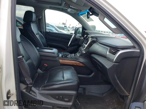 2015 Chevrolet Suburban LTZ with VIN 1GNSKKKC5FR127201, listed as a IAAI auction lot 41706562 with 151,644 mi miles and . Bid and sale history available at DreamBid. Image 5.