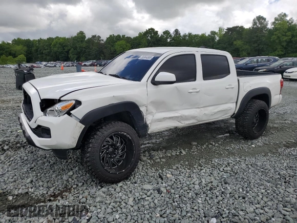 2021 Toyota Tacoma SR с VIN 3TMCZ5AN4MM386662, выставлен на аукционе Copart как лот 56954865 с пробегом 70 623 миль миль и Списание • Salvage title. История ставок и продаж доступна на DreamBid. Изображение 1.