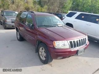 2002 Jeep Grand Cherokee Laredo with VIN 1J4GW48S12C261093, listed as a IAAI auction lot 41867012 with 92,957 mi miles. Bid and sale history available at carsss.com. Image 1.