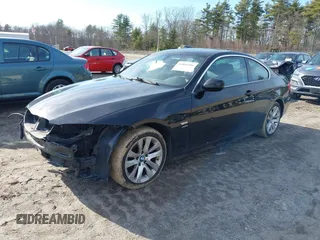 2011 BMW 3 Series 328i xDrive with VIN WBAKF5C52BE655212, listed as a IAAI auction lot 41802186 with 185,014 mi miles. Bid and sale history available at carsss.com. Image 2.