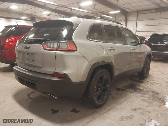 2019 Jeep Cherokee Latitude Plus with VIN 1C4PJMLX2KD427395, listed as a IAAI auction lot 41586532 with 84,033 mi miles. Bid and sale history available at carsss.com. Image 4.