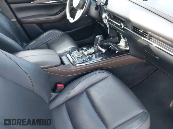 2023 Mazda CX-30 S Premium with VIN 3MVDMBDM7PM528297, listed as a IAAI auction lot 41637542 with 48,935 mi miles and . Bid and sale history available at DreamBid. Image 5.