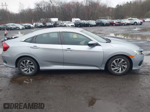 2016 Honda Civic EX with VIN 19XFC2F75GE217935, listed as a IAAI auction lot 41963307 with 87,477 mi miles and . Bid and sale history available at DreamBid. Image 13.