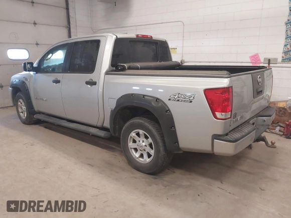 2005 Nissan Titan LE with VIN 1N6AA07BX5N507715, listed as a IAAI auction lot 41848566 with 254,548 mi miles. Bid and sale history available at carsss.com. Image 3.