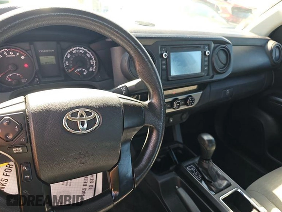 2017 Toyota Tacoma SR with VIN 5TFRX5GN3HX103224, listed as a IAAI auction lot 42849125 with 189,559 mi miles and . Bid and sale history available at DreamBid. Image 3.