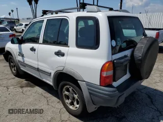 2001 Chevrolet Tracker ZR2 z VIN 2CNBJ734816935414, wystawiony jako Copart lot #54877235 z przebiegiem 117 483 mil mil oraz Szkoda całkowita • Salvage title. Historia ofert i sprzedaży dostępna na DreamBid. Obrazek 2.