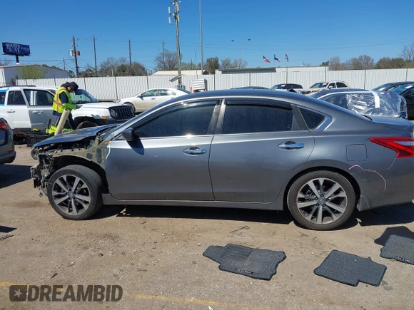 2016 Nissan Altima SR with VIN 1N4AL3AP1GC285363, listed as a IAAI auction lot 41754598 with 121,923 mi miles and . Bid and sale history available at carsss.com. Image 14.