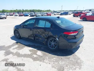 2021 Toyota Corolla LE with VIN 5YFEPMAE1MP247493, listed as a IAAI auction lot 40090331 with 111,994 mi miles. Bid and sale history available at carsss.com. Image 3.