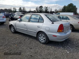 2005 Hyundai Accent GLS with VIN KMHCG45C05U618580, listed as a Copart auction lot 79239064 with 54,228 mi miles and Salvage Title. Bid and sale history available at carsss.com. Image 2.