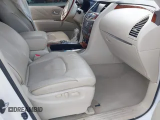 2016 Infiniti QX80 with VIN JN8AZ2NE7G9125016, listed as a IAAI auction lot 42080053 with 114,655 mi miles. Bid and sale history available at carsss.com. Image 5.