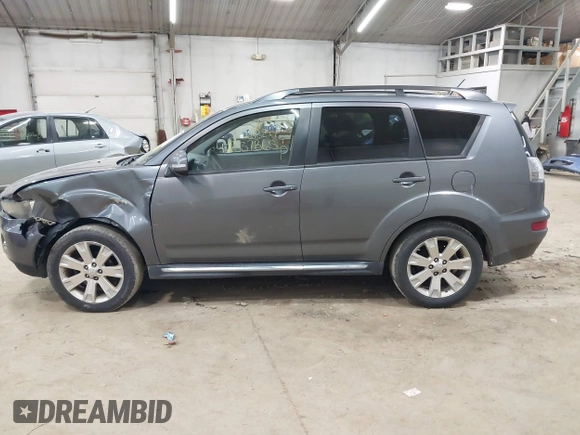 2011 Mitsubishi Outlander SE z VIN JA4JT3AWXBU007978, wystawiony jako IAAI lot #42337365 z przebiegiem 239 587 mil mil oraz . Historia ofert i sprzedaży dostępna na DreamBid. Obrazek 14.
