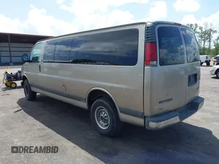 2001 Chevrolet Express with VIN 1GAHG39R711229376, listed as a IAAI auction lot 41948861 with 124,925 mi miles and . Bid and sale history available at carsss.com. Image 3.