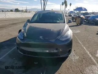 2024 Tesla Model Y Long Range с VIN 7SAYGDEE3RA236473, выставлен на аукционе Copart как лот 77409334 с пробегом 5 822 миль миль и Списание • Salvage title. История ставок и продаж доступна на DreamBid. Изображение 12.