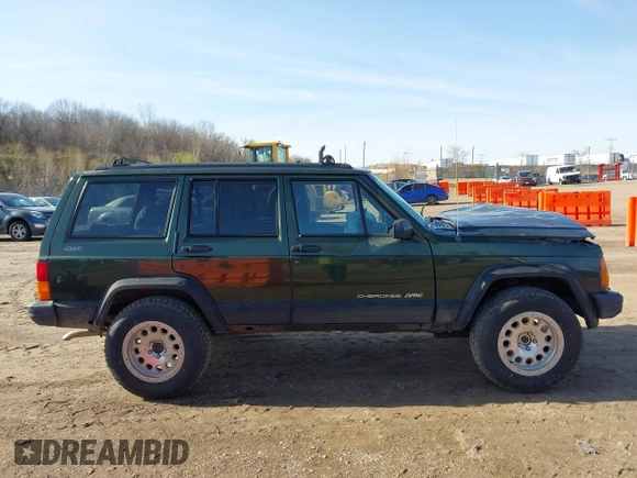 1996 Jeep Cherokee Sport with VIN 1J4FJ68S2TL299150, listed as a IAAI auction lot 41932867 with 142,761 mi miles. Bid and sale history available at carsss.com. Image 13.