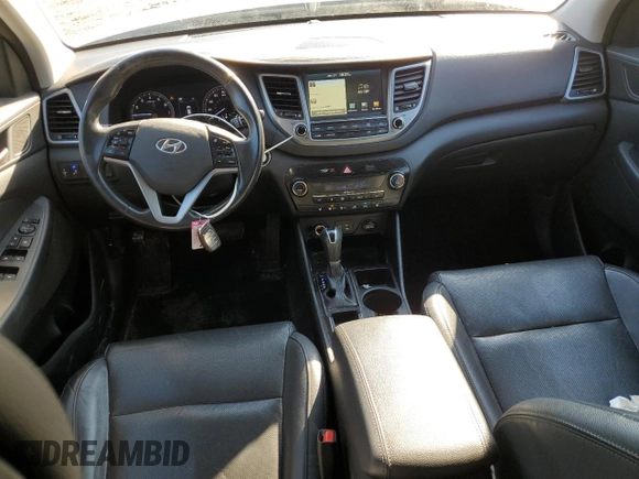 2017 Hyundai Tucson SE with VIN KM8J33A46HU519309, listed as a Copart auction lot 42677955 with 127,202 mi miles and Salvage Title. Bid and sale history available at DreamBid. Image 8.
