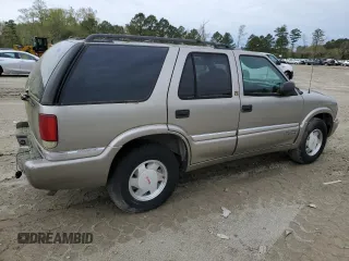 2000 GMC Jimmy SL with VIN 1GKCS13W6Y2293842, listed as a Copart auction lot 49449164 with 101,305 mi miles and Clean Title. Bid and sale history available at carsss.com. Image 3.