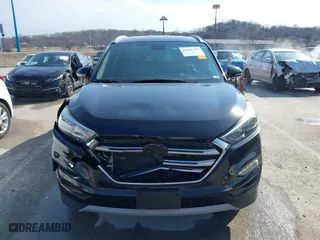 2017 Hyundai Tucson Value with VIN KM8J33A25HU586191, listed as a IAAI auction lot 41682127 with 58,877 mi miles. Bid and sale history available at carsss.com. Image 12.