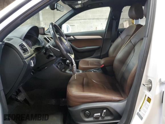 2018 Audi Q3 Premium with VIN WA1BCCFS9JR000127, listed as a Copart auction lot 58555755 with 60,295 mi miles and Salvage title. Bid and sale history available at DreamBid. Image 7.
