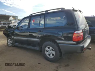 2000 Toyota Land Cruiser with VIN JT3HT05J6Y0086734, listed as a Copart auction lot 84870974 with 228,873 mi miles and Clean Title. Bid and sale history available at carsss.com. Image 2.