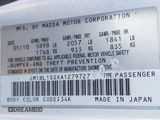 2010 Mazda Mazda3 i Touring with VIN JM1BL1SGXA1279727, listed as a IAAI auction lot 41975536 with 164,891 mi miles. Bid and sale history available at carsss.com. Image 9.