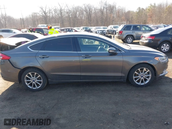 2017 Ford Fusion SE z VIN 3FA6P0HDXHR321008, wystawiony jako IAAI lot #41620779 z przebiegiem 110 116 mil mil oraz . Historia ofert i sprzedaży dostępna na DreamBid. Obrazek 13.