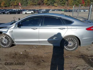 2016 Ford Fusion Titanium with VIN 3FA6P0K9XGR100723, listed as a IAAI auction lot 40627172 with 1 mi miles. Bid and sale history available at carsss.com. Image 13.