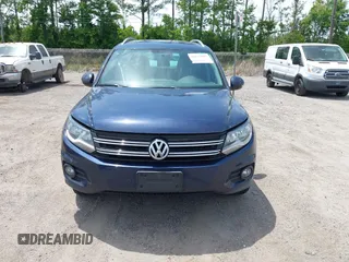 2012 Volkswagen Tiguan SEL with VIN WVGAV7AX7CW608637, listed as a IAAI auction lot 42173987 with 149,013 mi miles and . Bid and sale history available at DreamBid. Image 6.