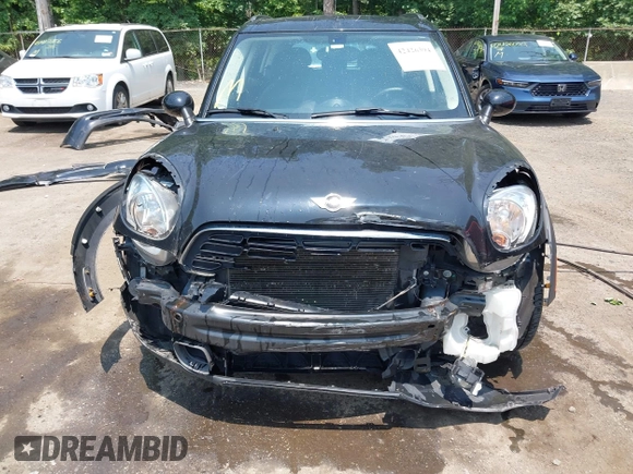 2015 MINI Countryman S with VIN WMWZC5C56FWP45115, listed as a IAAI auction lot 42426394 with 52,937 mi miles and . Bid and sale history available at DreamBid. Image 6.