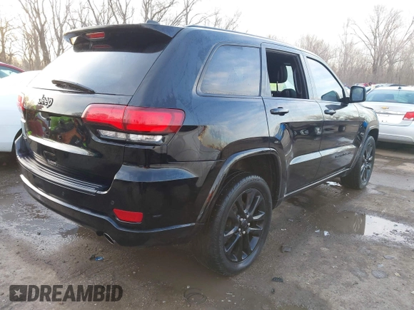 2019 Jeep Grand Cherokee Laredo E with VIN 1C4RJFAG4KC608897, listed as a IAAI auction lot 41771603 with 106,525 mi miles and . Bid and sale history available at DreamBid. Image 4.