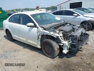 2014 Volkswagen Jetta SE with VIN 3VWD17AJ9EM297415, listed as a IAAI auction lot 42594534 with 170,581 mi miles and . Bid and sale history available at DreamBid. Image 1.