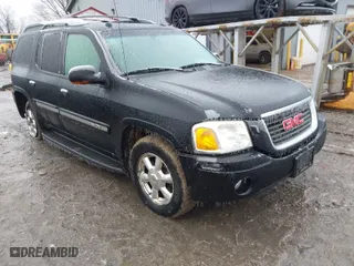 2005 GMC Envoy XL SLE with VIN 1GKET16S156160473, listed as a IAAI auction lot 41510661 with 233,942 mi miles. Bid and sale history available at carsss.com. Image 1.