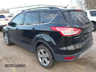 2013 Ford Escape SE with VIN 1FMCU9GXXDUC14903, listed as a IAAI auction lot 41826982 with 166,233 mi miles and . Bid and sale history available at DreamBid. Image 3.